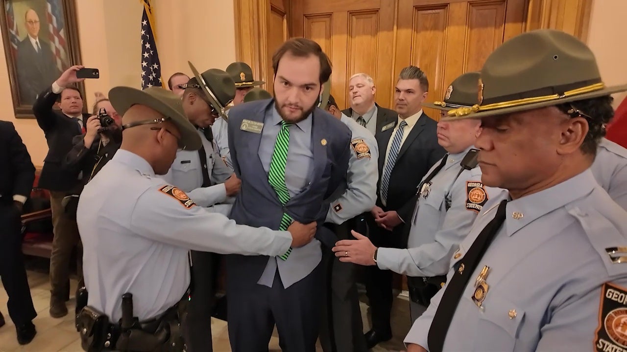 Georgia Sen. Moore defies ban, receives warm welcome post-arrest Georgia Sen. Moore defies ban, receives warm welcome post-arrest
