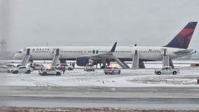 4 injured after evacuation of Delta plane at Atlanta airport