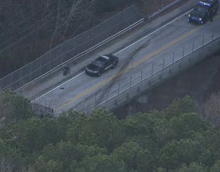 Armed hijacker crashes into two cars over I-285, leads police