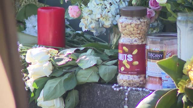 Tributes for President Carter: Flowers, letters, and peanuts left at Carter Center