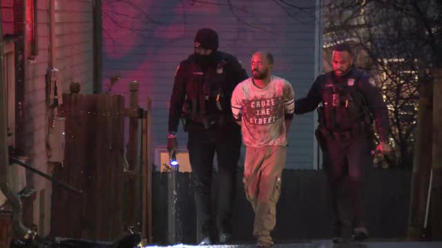 Man taken into custody after SW Atlanta house fire