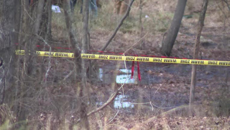 Crews work near a possible gasoline spill along the Colonial Pipeline near Peg Cole Bridge Trail near Villa Rica on Jan. 14, 2025.