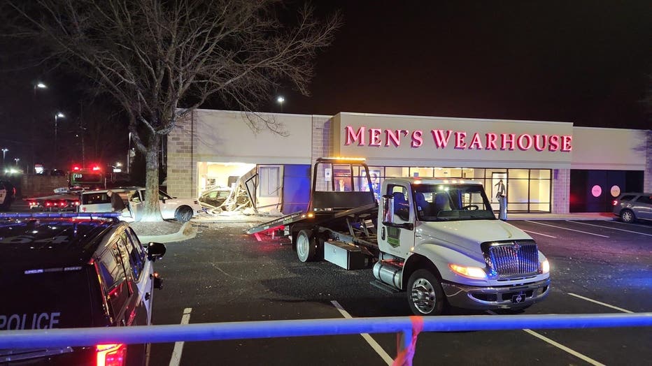 Douglasville police investigate after a chase which ended in the storefront of the Men’s Warehouse along Chapel Hill Road on Jan. 3, 2025.