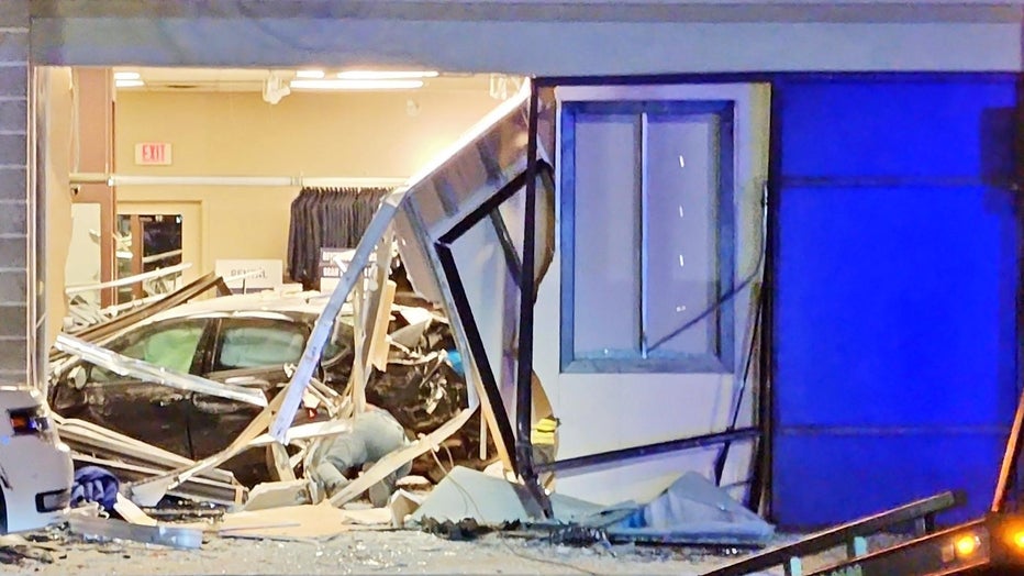 Douglasville police investigate after a chase which ended in the storefront of the Men’s Warehouse along Chapel Hill Road on Jan. 3, 2025.