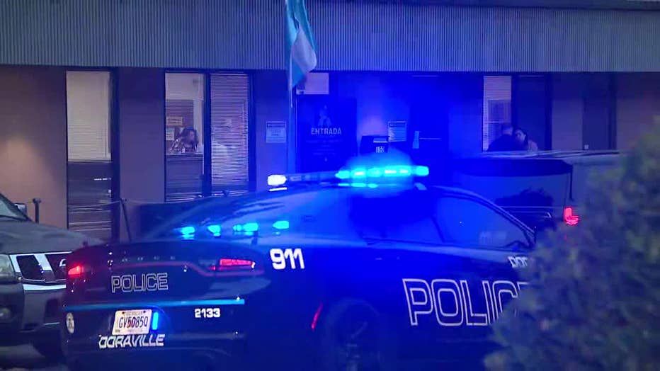 Officers investigate a double shooting in the parking lot of a business complex in the6700 block of Peachtree Industrial Boulevard in Doraville on Jan. 6, 2025.