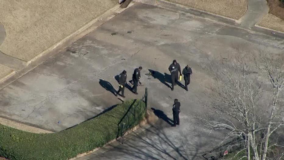 DeKalb County police investigate a shooting along Rainbow Creek Drive on Jan. 2, 2024.