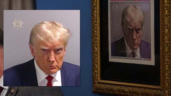 Trump's mug shot from Fulton County Jail hangs in White House