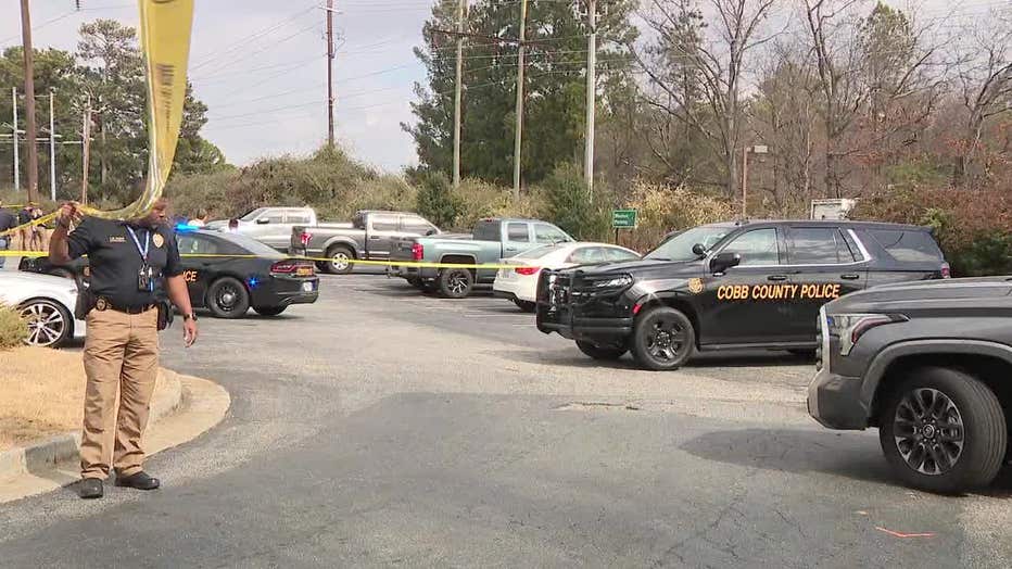 Cobb County police investigate a deadly shooting at the Windy Hill Village located off Windy Hill Road on Feb. 5, 2025.