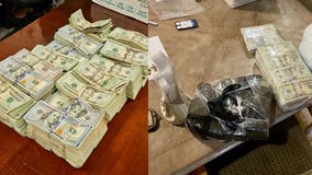 Heroin, $261K in cash, guns seized in Cobb County drug bust