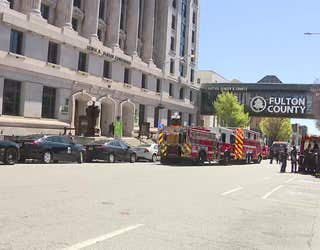 Officials respond to a report of a suspicious substance at the Fulton County courthouse in downtown Atlanta on March 21, 2025.