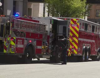 Officials respond to a report of a suspicious substance at the Fulton County courthouse in downtown Atlanta on March 21, 2025.