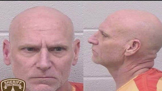 Son charged with murder after killing father, injuring neighbor