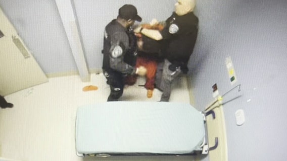 Cuffed, shackled Cobb County inmate punched and choked by deputy