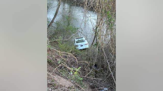 Driver charged after Austell police find car in river
