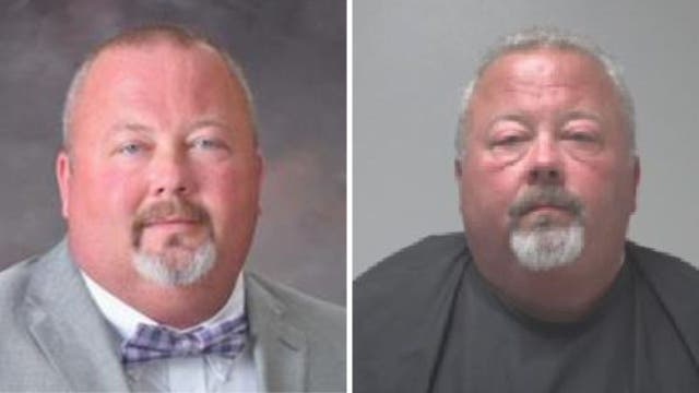 East Coweta High School principal violent charges dropped
