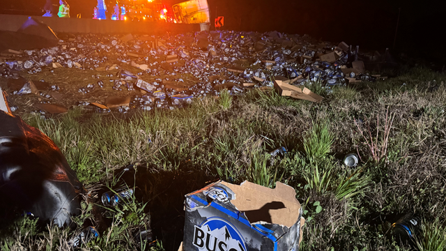 Semi-truck loses its load of beer after overturning on I-285 in DeKalb County