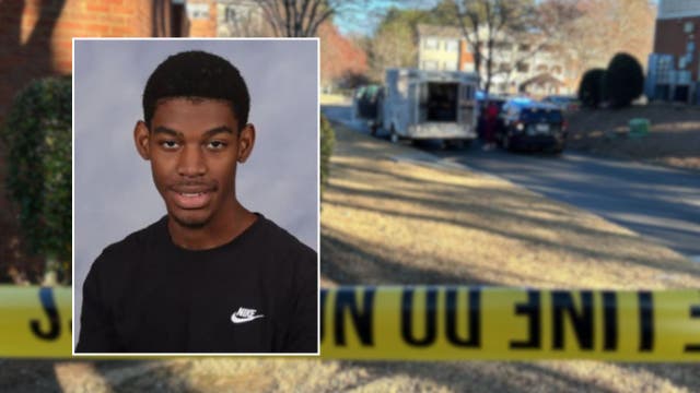 Mom with knife shot by police after allegedly stabbing son to death, officials say