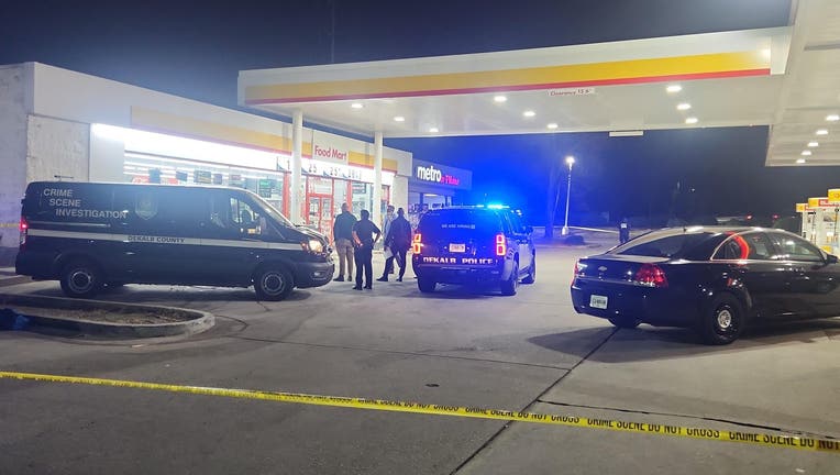 DeKalb County police investigate a deadly shooting at the Shell gas station in the 2900 block of Panola Road south of I-20 on March 4, 2025.