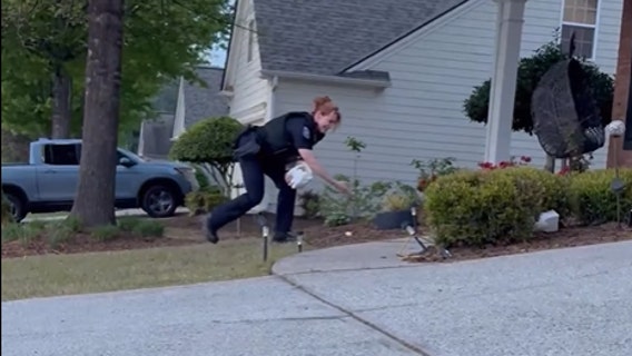 Woodstock's public safety teams surprise residents with 10,000 easter eggs