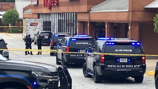 2 bystanders shot in DeKalb County grocery store, police say