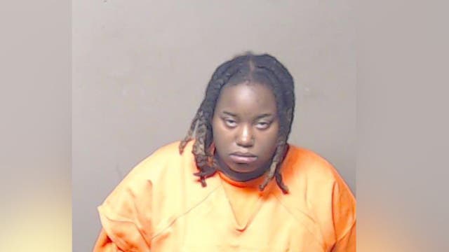 Woman arrested for fatal shooting on Derwin Brown Drive in DeKalb County