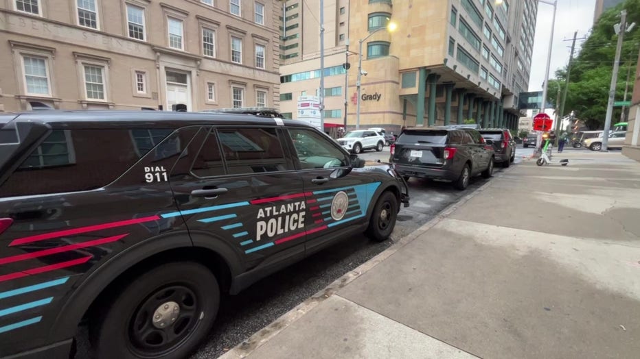 Police vehicle in front of Grady Memorial Hospital after a Fulton County Sheriff’s deputy was shot in downtown Atlanta on April 24, 2025.