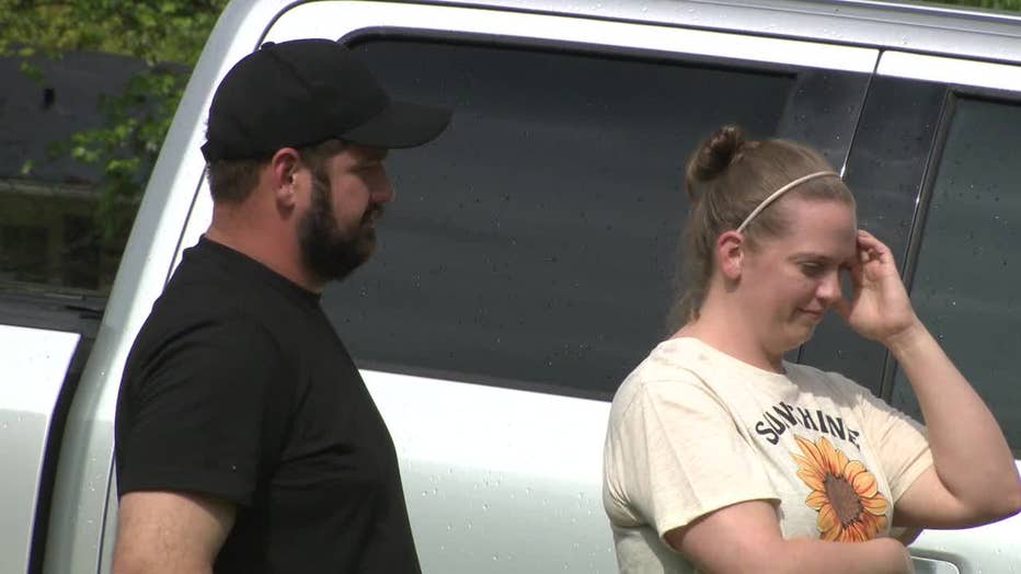 A Conyers family say their home burned down while they rushed their toddler to the emergency room.