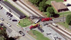 Train collision with asphalt truck causes minor spill in Emerson