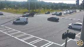 Caught on camera: Driver cited for running red light, crashing