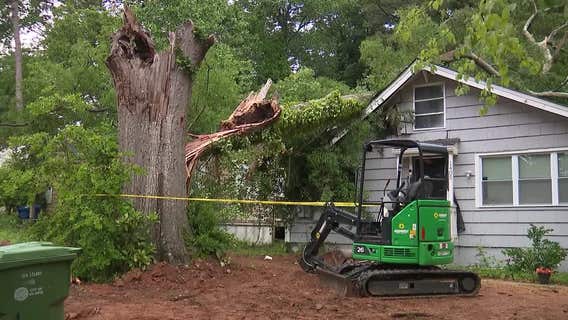 PHOTOS: Snapped tree kills girl, lightning burns home, severe weather damage in metro Atlanta