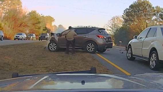 Fayette County deputy who rushed to driver's aid surprised later with flowers