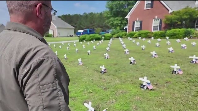 Retiring officer transforms yard into memorial for Georgia's fallen heroes