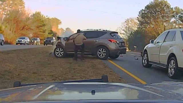 Fayette County deputy who rushed to driver's aid surprised later with flowers