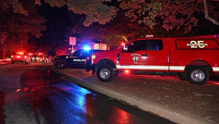 Firefighters battle a blaze at the Aspen Pointe Apartment Complex in Roswell on May 17, 2025.