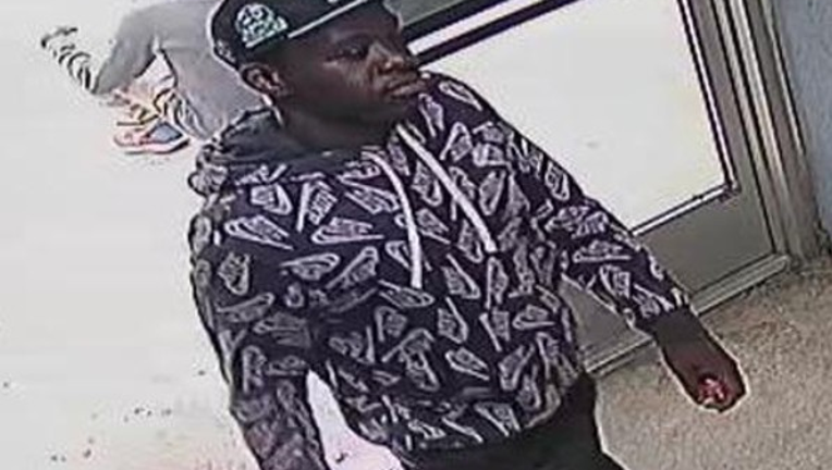 The Atlanta Police Department says the man seen in this photo is a person of interest in a deadly shooting along Forsyth Street near the Garnett MARTA Station on May 17, 2025.