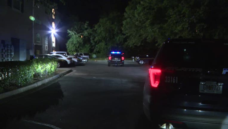Police investigate a shooting at 2423 Martin Luther King Jr. Drive NW on May 13, 2025.