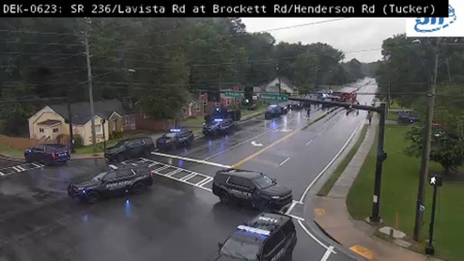 Police swarm the area of LaVista Road at Henderson Road in Tucker on May 29, 2025.