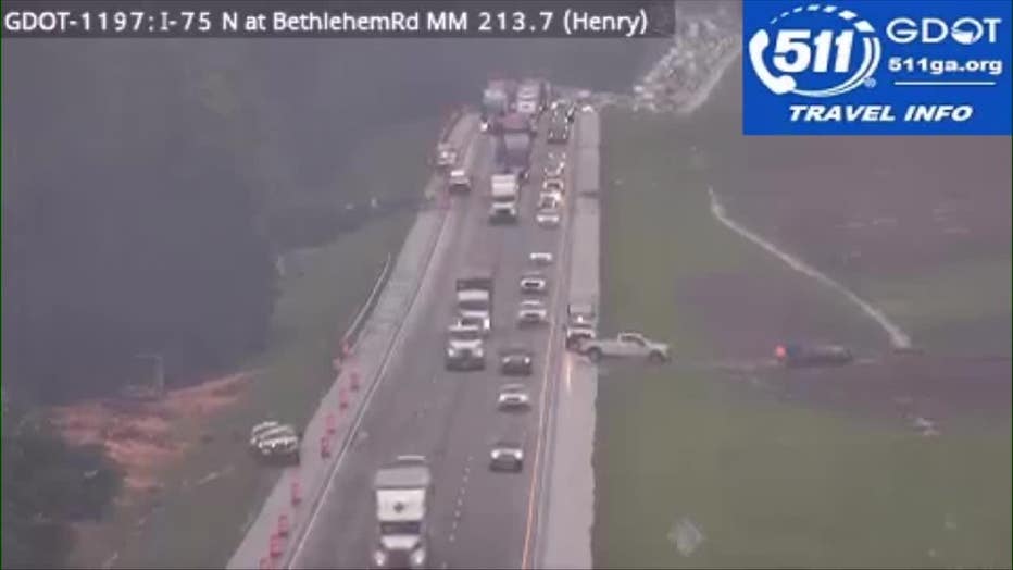 A tree falls across several lanes of I-75 at Bethlehem Road in McDonough on May 29, 2025.