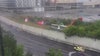 Drivers surprised by inflatable slides blown onto Downtown Connector