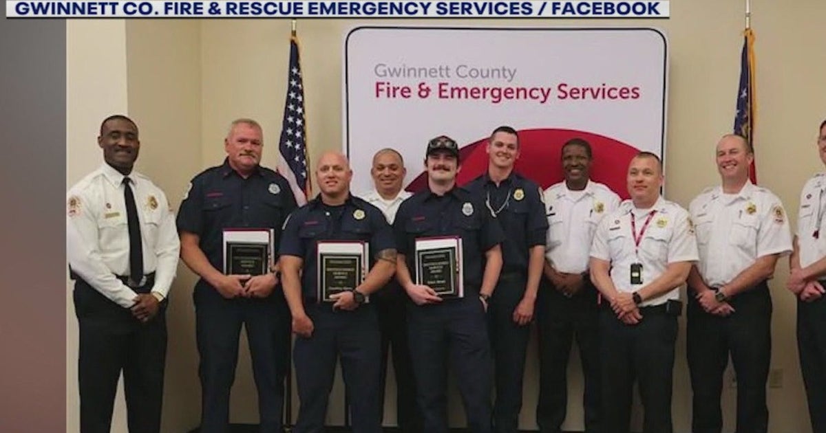 Gwinnett firefighters honored for rescuing man trapped in house fire ...