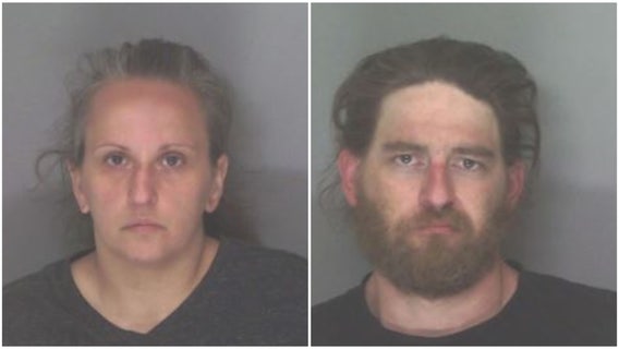 Douglasville couple charged for locking toddler in shed