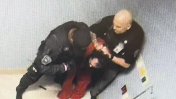 Restrained inmate held in chokehold still 'under investigation' months after reported