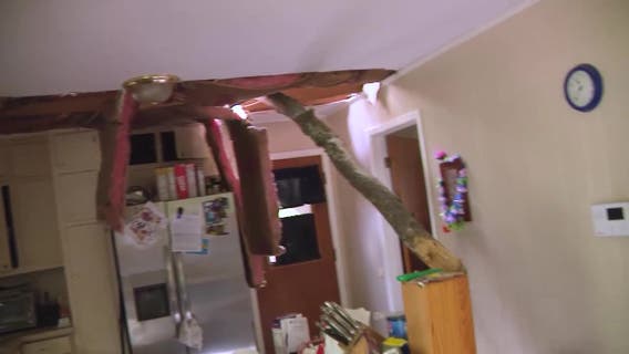 Fayetteville family escapes injury as massive tree crashes through home during storm
