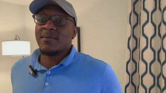 Marine vet, single father surprised by Warrick Dunn at new home