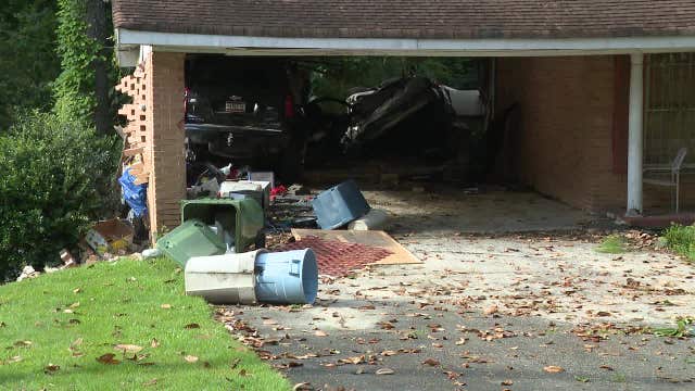Driver hospitalized after car crashes into SW Atlanta home