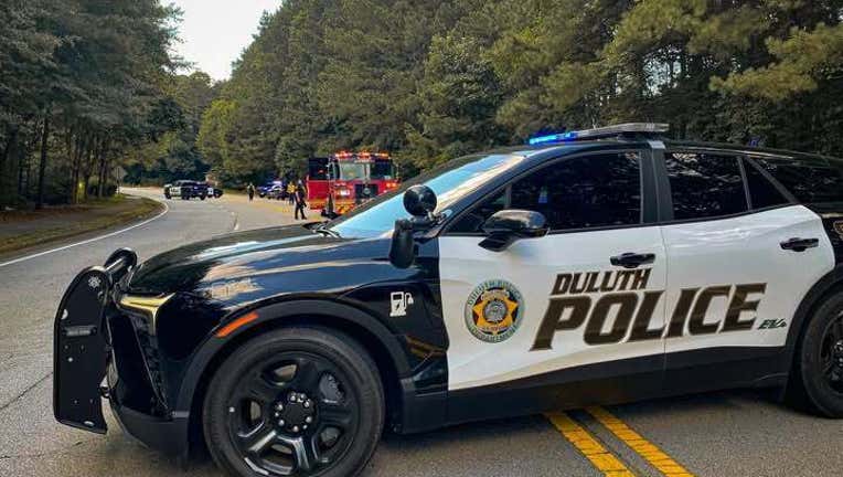 The Duluth Police Department released this photo of first responders on the scene of a deadly motorcycle crash along Summit Ridge Parkway between Pleasant Hill Road and Peachtree Industrial Blvd. in Duluth on June 23, 2025.