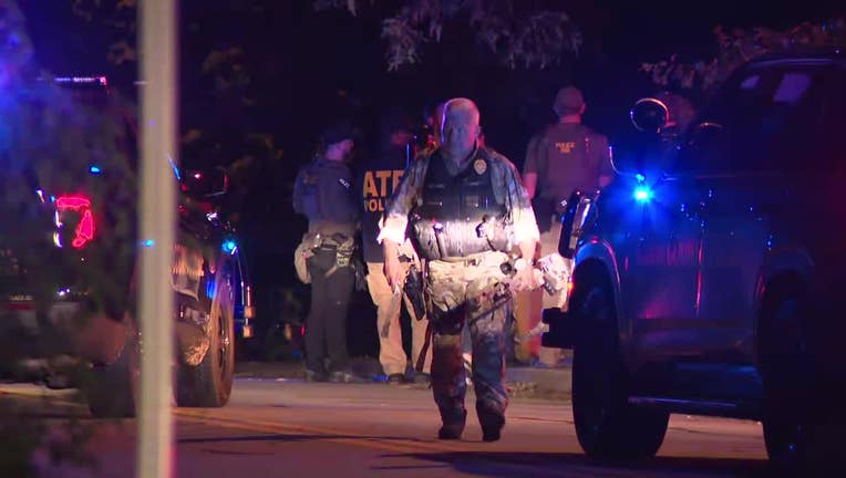 Federal agents could be seen during a reported SWAT team call out at Mitchell's Grocery store located Pisgah Road at Old Alabama Road in Mableton on June 5, 2025.