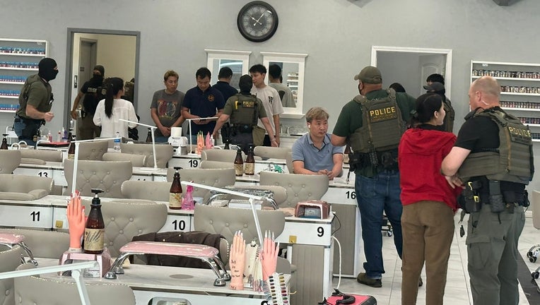 Homeland Security Investigations agents raid Luxx Nail Lounge, located at 2769 Chastain Meadows Parkway NW in Cobb County on June 4, 2025.