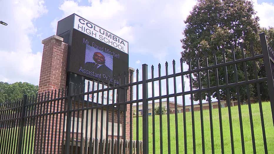 A sign outside of Columbia High School honors Dr. Phillip McCrary, a respected coach with 30 years of experience, on June 27, 2025.