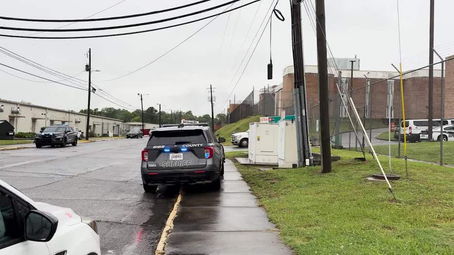 Bibb County sheriff’s deputies surround the jail after a report of a fight on June 4, 2025.